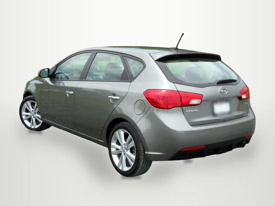 Kia Forte5 hatchback, rear three-quarter — edited