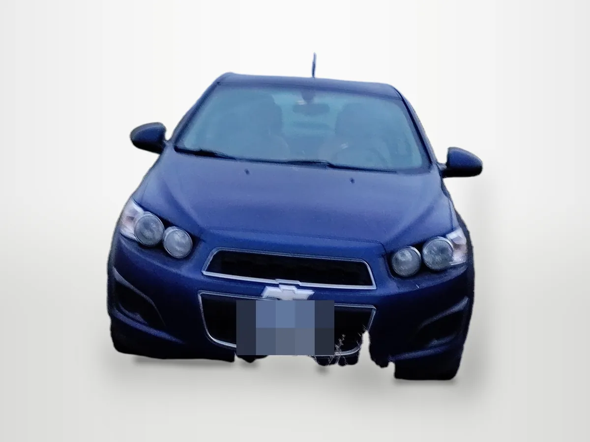 Chevrolet Sonic sedan on a dirt track in a field, front view, result